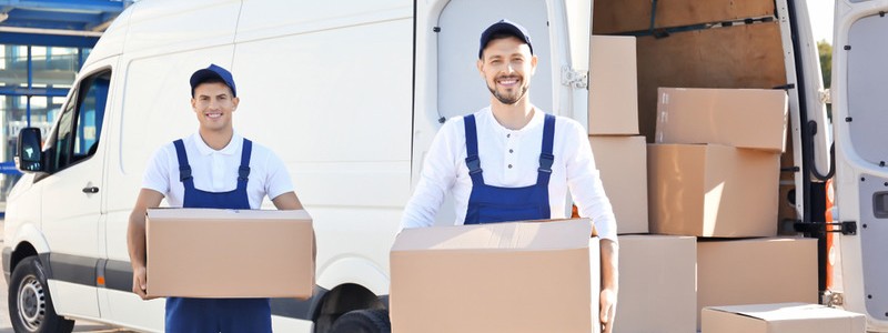 professional removalists with moving boxes
