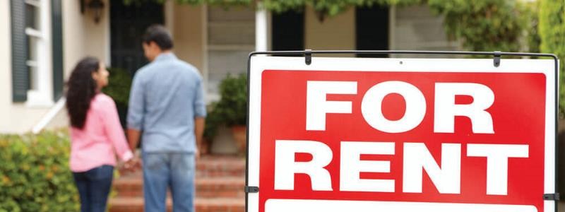 a couple is inspecting a residential property for rent