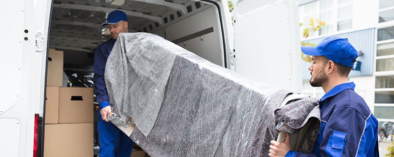 professionals loading the household in a truck