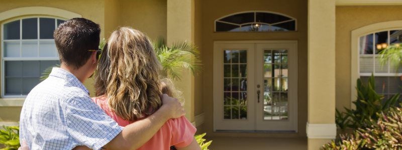 family looking towards their new house in Gold Coast