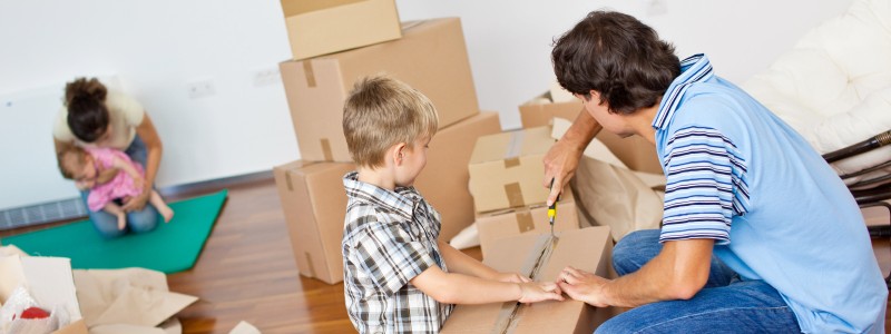 Entire family preparing for a house relocation