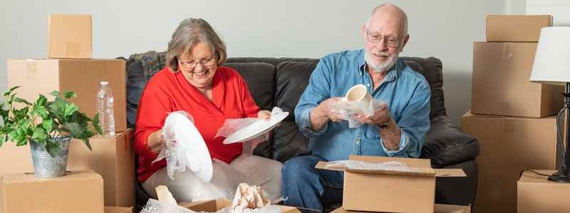 old age couple preparing for their house relocation