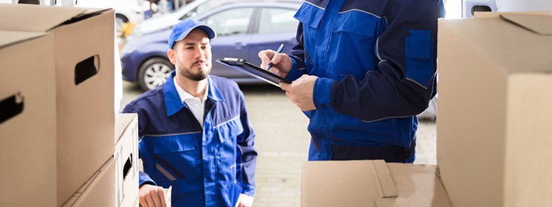 Professional movers loading a moving truck