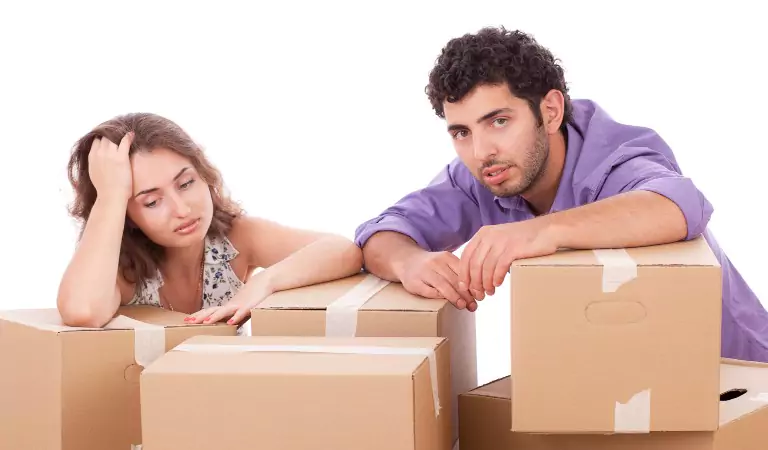 young couple looking stressed