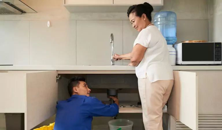 professional and a woman inside of a kitchen